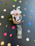 7 Brew With Pink Bow Badge Reel