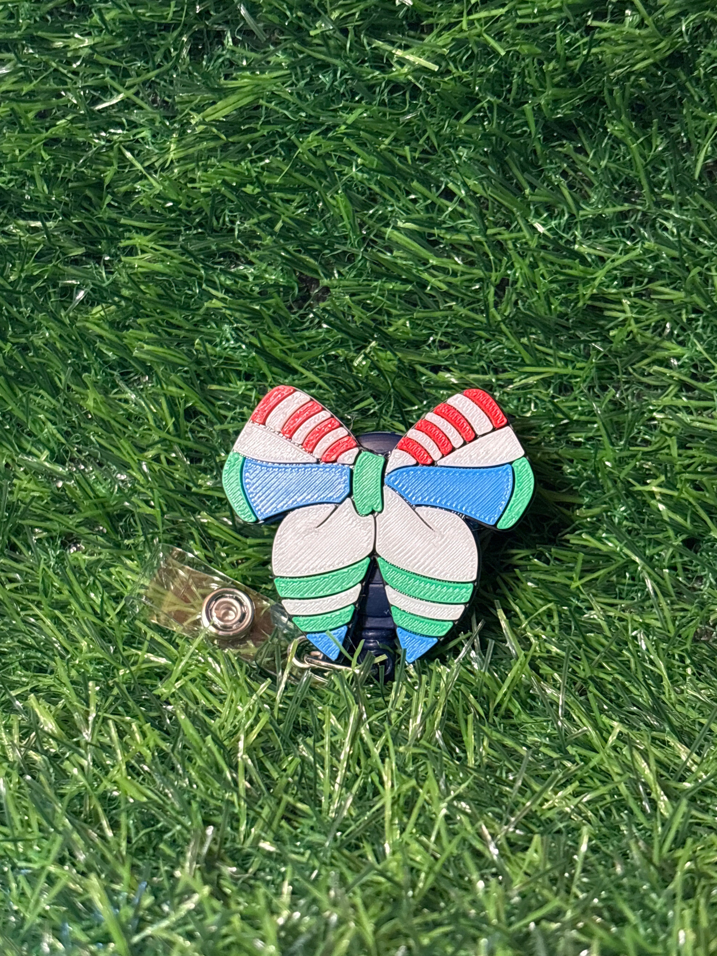 Buzz Bow Badge Reel