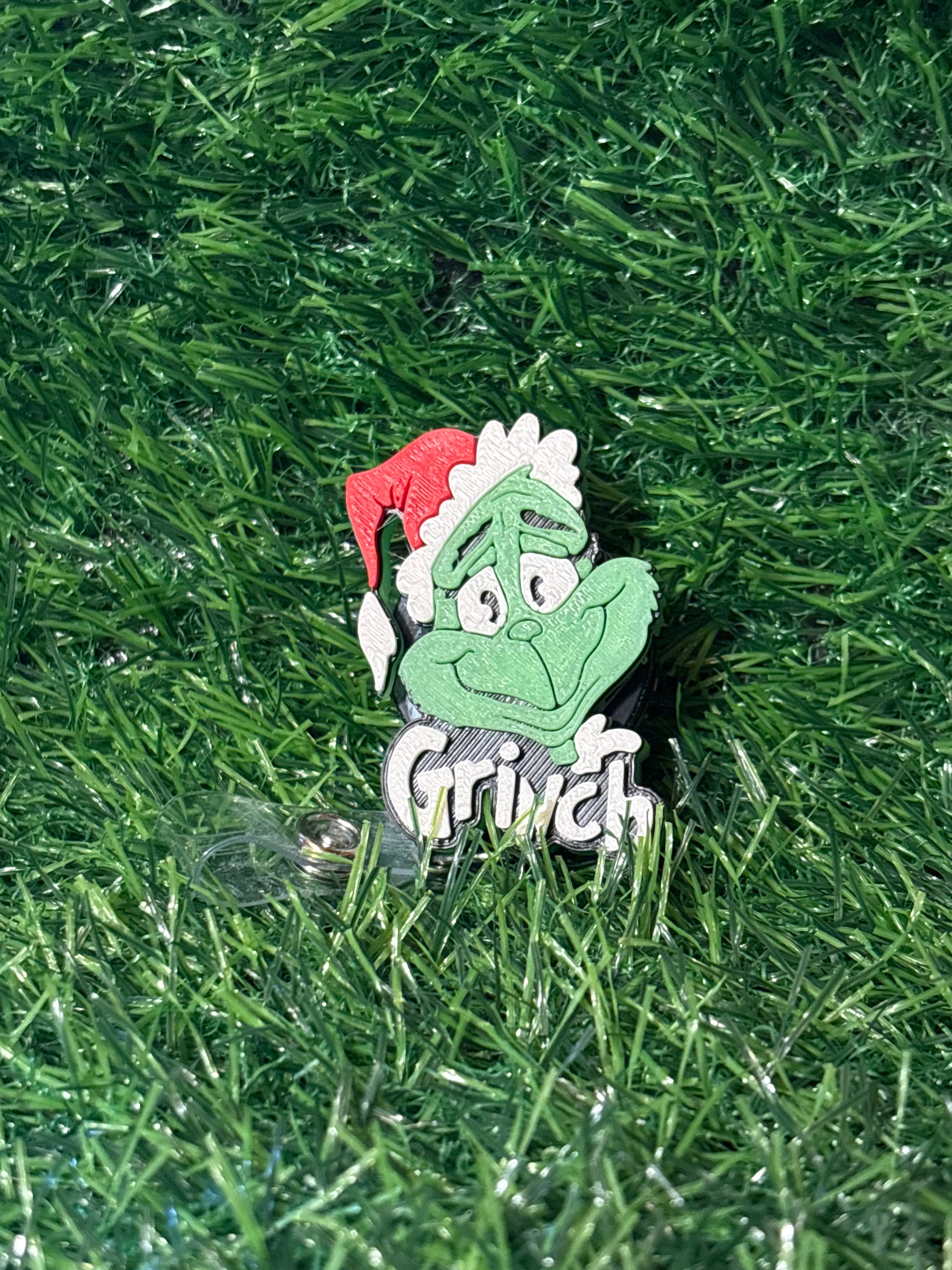 Grinch badge reel