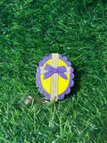 Cross With Bow Badge Reel