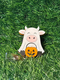 Cow With Pumpkin Badge Reel