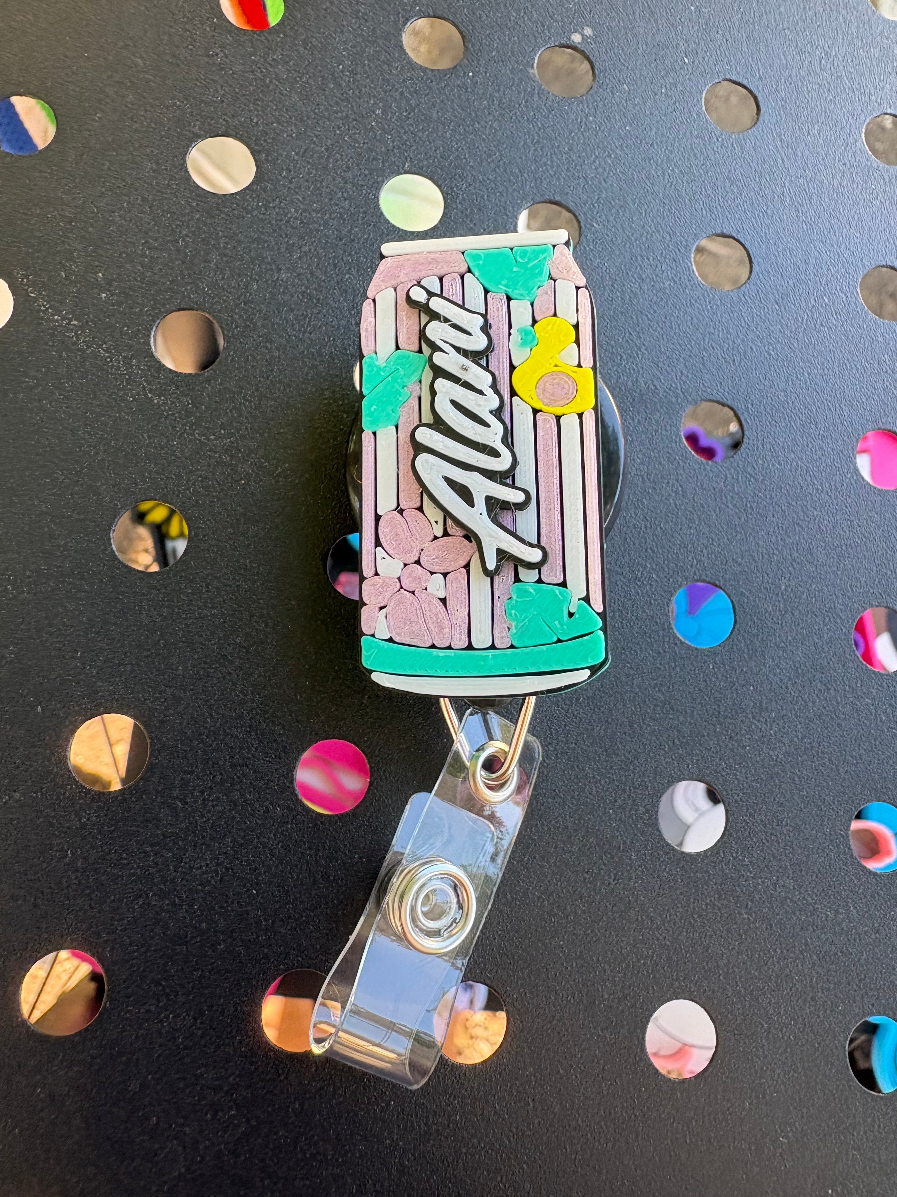 Alani Teal Badge Reel