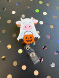 Cow With Pumpkin Badge Reel